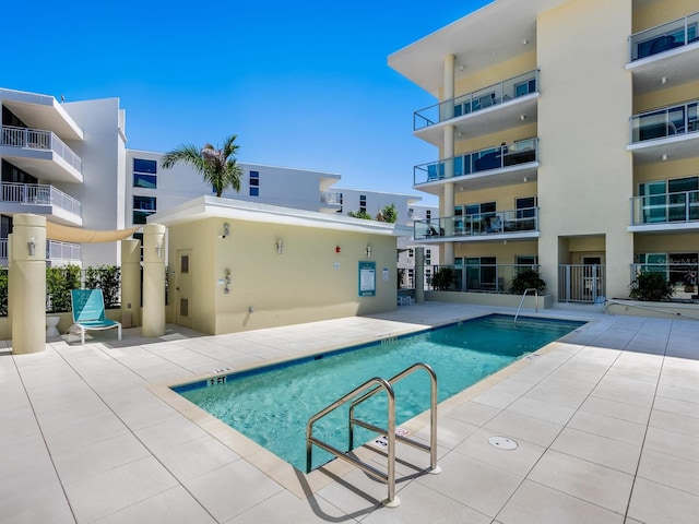 6512 Midnight Pass Rd Unit 301, Sarasota, FL 34242 - community pool featuring a patio
