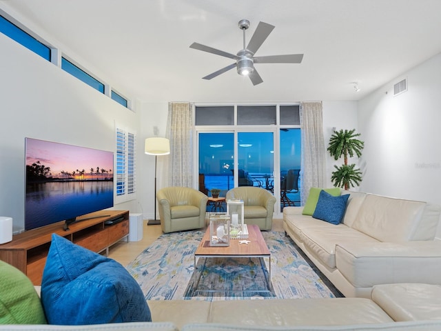 6512 Midnight Pass Rd Unit 301, Sarasota, FL 34242 - living room featuring a ceiling fan