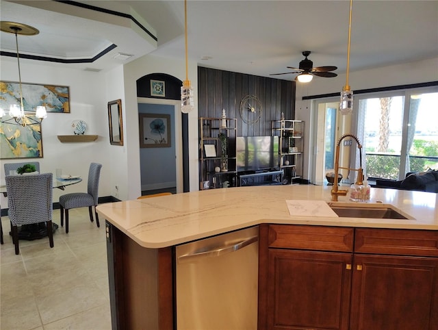 1241 Riverscape St Unit B, Bradenton, FL 34208 - kitchen featuring stainless steel dishwasher, a sink, a ceiling fan, a chandelier, and open floor plan