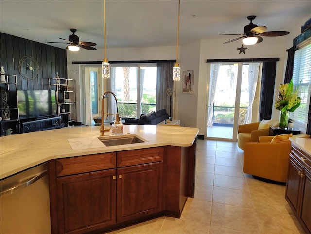 1241 Riverscape St Unit B, Bradenton, FL 34208 - kitchen with open floor plan, stainless steel dishwasher, a ceiling fan, and light countertops