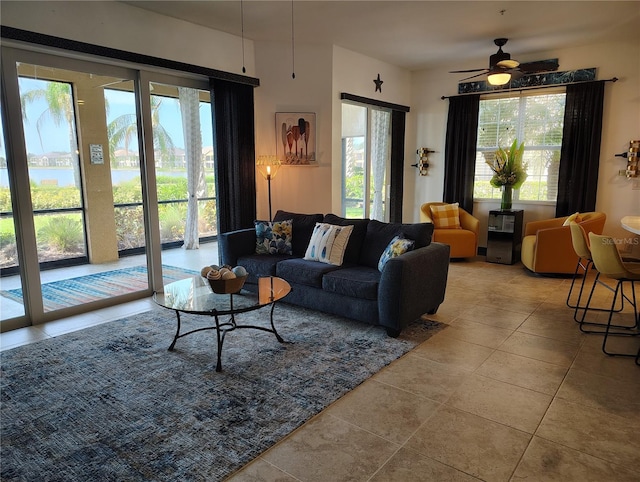1241 Riverscape St Unit B, Bradenton, FL 34208 - tiled living area with plenty of natural light and ceiling fan
