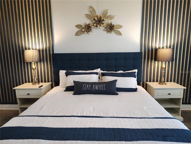 1241 Riverscape St Unit B, Bradenton, FL 34208 - bedroom featuring wallpapered walls, wood finished floors, and baseboards
