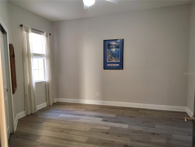 1241 Riverscape St Unit B, Bradenton, FL 34208 - spare room with ceiling fan, wood finished floors, and baseboards