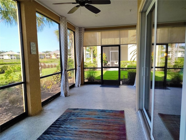 1241 Riverscape St Unit B, Bradenton, FL 34208 - unfurnished sunroom with a ceiling fan and healthy amount of natural light