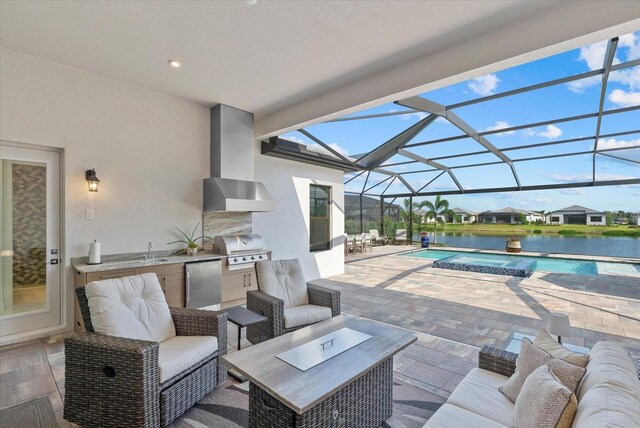 8982 Baroque Ter, Sarasota, FL 34240 - view of patio featuring an outdoor living space, glass enclosure, a pool with connected hot tub, a sink, and a water view