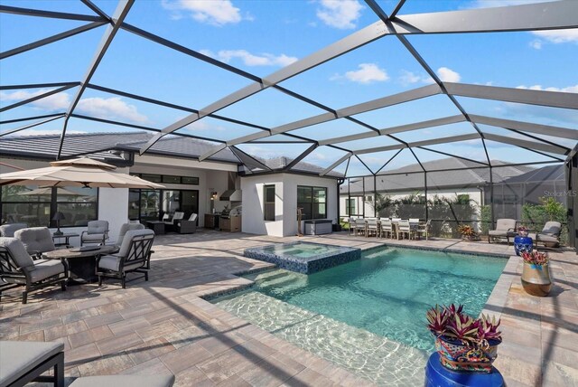 8982 Baroque Ter, Sarasota, FL 34240 - view of swimming pool featuring a patio, outdoor lounge area, a pool with connected hot tub, and glass enclosure