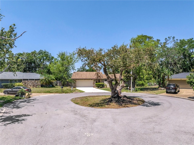 435 Whispering Oaks Ct, Sarasota, FL 34232 - view of front of house with curved driveway