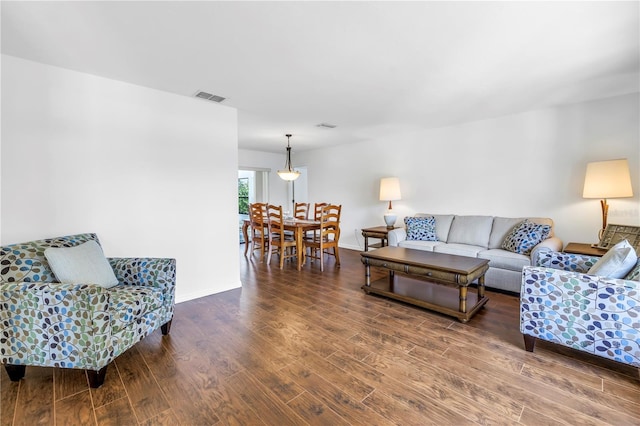435 Whispering Oaks Ct, Sarasota, FL 34232 - living area with wood finished floors and baseboards