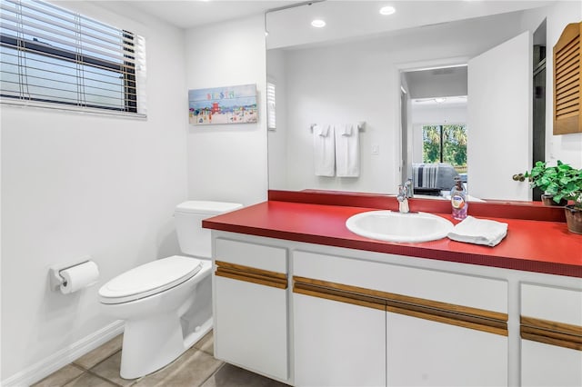 435 Whispering Oaks Ct, Sarasota, FL 34232 - bathroom with toilet, vanity, recessed lighting, tile patterned floors, and baseboards