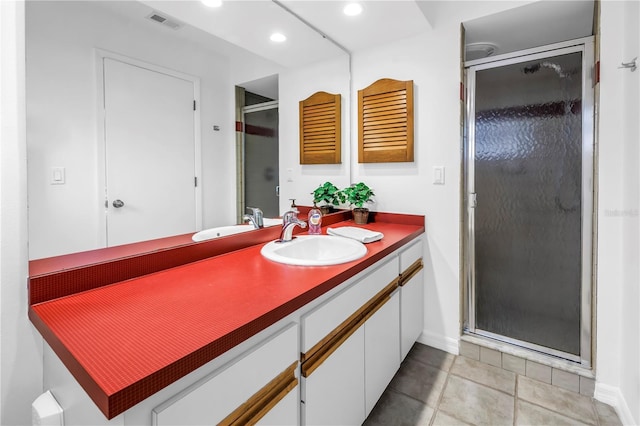 435 Whispering Oaks Ct, Sarasota, FL 34232 - bathroom with vanity, a shower stall, baseboards, recessed lighting, and tile patterned flooring