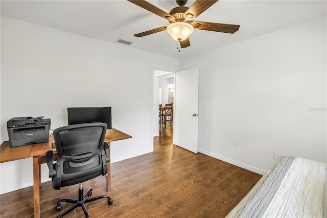 435 Whispering Oaks Ct, Sarasota, FL 34232 - home office with baseboards, wood finished floors, and ceiling fan