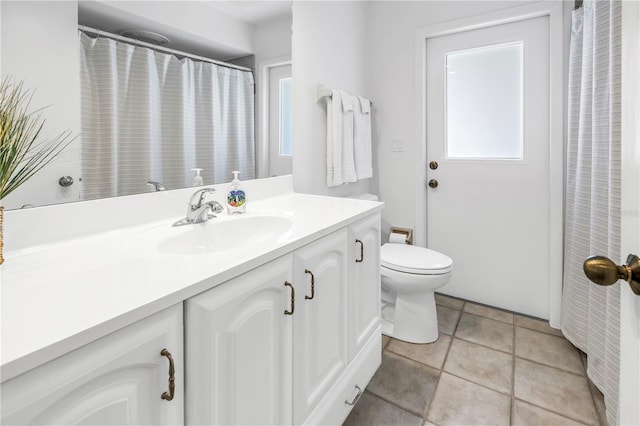 435 Whispering Oaks Ct, Sarasota, FL 34232 - bathroom with vanity, plenty of natural light, and toilet