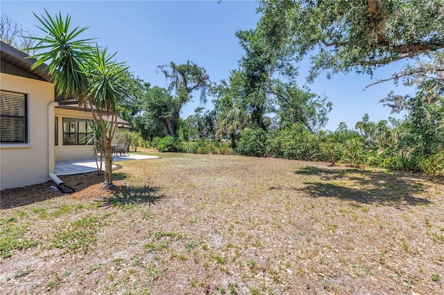 435 Whispering Oaks Ct, Sarasota, FL 34232 - view of yard with a patio area