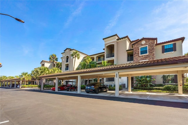 17118 Vardon Ter Unit 404, Bradenton, FL 34211 - view of property with covered parking