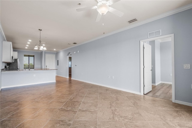 17118 Vardon Ter Unit 404, Bradenton, FL 34211 - unfurnished living room featuring crown molding, a chandelier, ceiling fan, light tile patterned floors, and baseboards