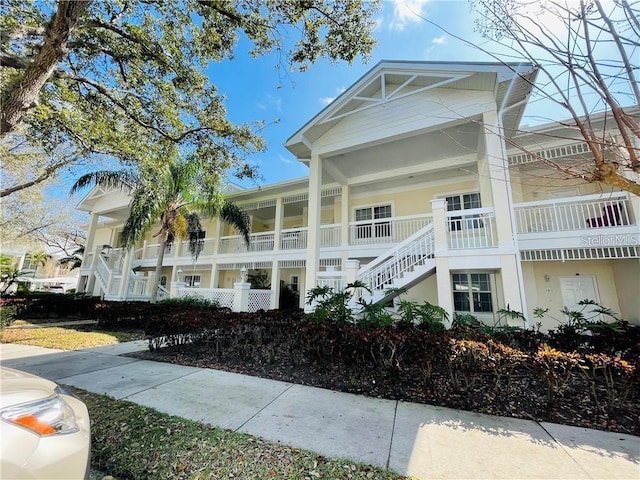 3702 54th Dr W Unit 102, Bradenton, FL 34210 - view of property with stairway