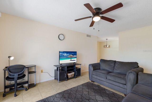 3253 Beneva Rd Unit 103, Sarasota, FL 34232 - living room featuring ceiling fan, light tile patterned floors, and baseboards