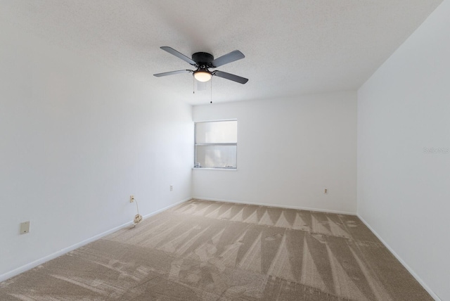 3253 Beneva Rd Unit 103, Sarasota, FL 34232 - spare room with light colored carpet, ceiling fan, and baseboards