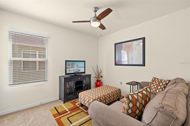 5358 Shell Mound Cir, Punta Gorda, FL 33982 - living area with carpet, baseboards, and ceiling fan