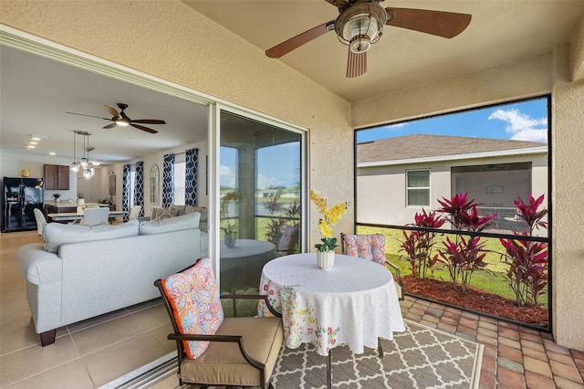 5358 Shell Mound Cir, Punta Gorda, FL 33982 - sunroom / solarium featuring a ceiling fan, an outdoor hangout area, and plenty of natural light