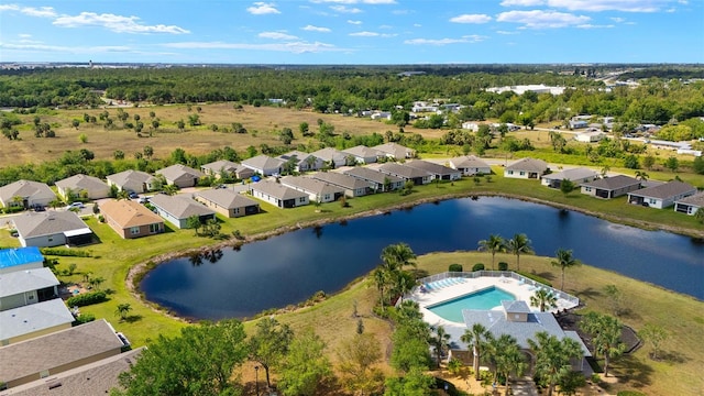 5358 Shell Mound Cir, Punta Gorda, FL 33982 - aerial perspective of suburban area with a pool and a large body of water