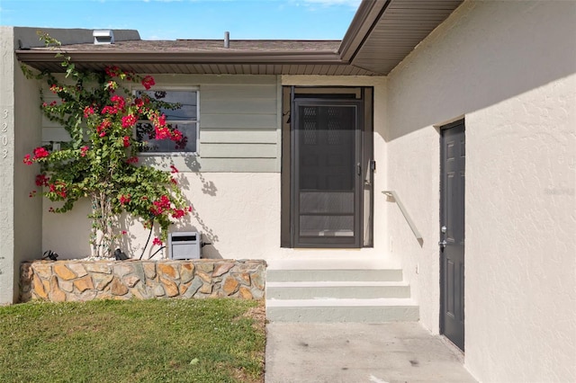 3203 Riverside Dr Unit B, Punta Gorda, FL 33950 - doorway to property featuring stucco siding