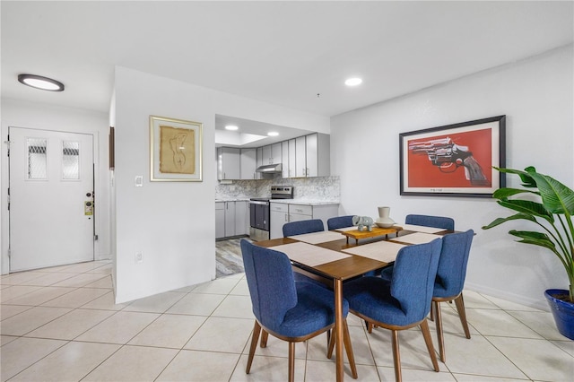 3203 Riverside Dr Unit B, Punta Gorda, FL 33950 - dining area with light tile patterned floors, recessed lighting, and baseboards