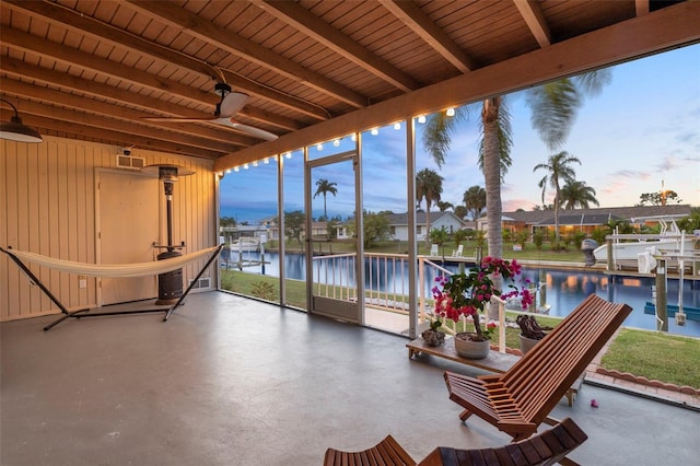 3203 Riverside Dr Unit B, Punta Gorda, FL 33950 - sunroom with a water view and beam ceiling