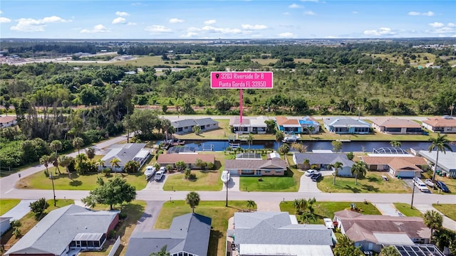 3203 Riverside Dr Unit B, Punta Gorda, FL 33950 - aerial perspective of suburban area featuring a nearby body of water