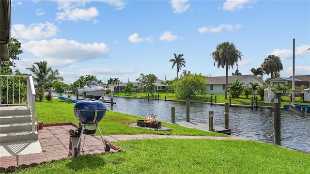 3203 Riverside Dr Unit B, Punta Gorda, FL 33950 - water view featuring a dock, a fire pit, and nearby suburban area