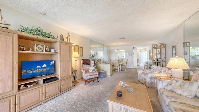 8897 Midnight Pass Rd Unit 407, Sarasota, FL 34242 - living area featuring light carpet, a chandelier, and a textured ceiling