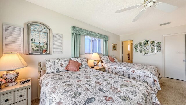8897 Midnight Pass Rd Unit 407, Sarasota, FL 34242 - bedroom with carpet and ceiling fan