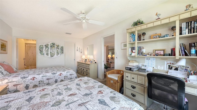 8897 Midnight Pass Rd Unit 407, Sarasota, FL 34242 - bedroom featuring ceiling fan and a textured ceiling