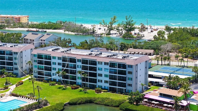 8897 Midnight Pass Rd Unit 407, Sarasota, FL 34242 - drone / aerial view of a large body of water and apartment complex / building