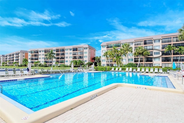 8897 Midnight Pass Rd Unit 407, Sarasota, FL 34242 - community pool with a patio