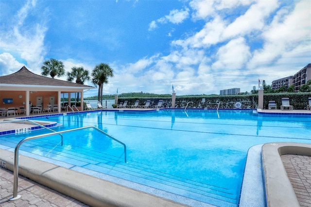 8897 Midnight Pass Rd Unit 407, Sarasota, FL 34242 - community pool with a patio