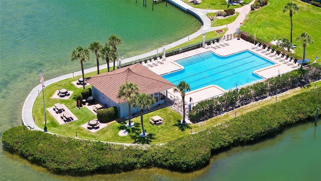 8897 Midnight Pass Rd Unit 407, Sarasota, FL 34242 - view of subject property with a pool area and a nearby body of water