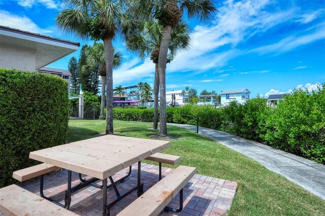 8897 Midnight Pass Rd Unit 407, Sarasota, FL 34242 - view of property's community featuring a patio