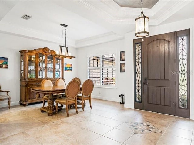 312 148th Ct NE, Bradenton, FL 34212 - foyer entrance with a tray ceiling, baseboards, ornamental molding, and light tile patterned floors