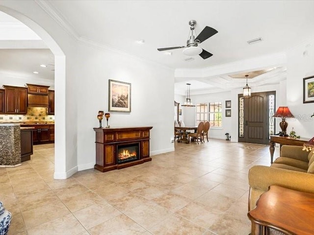 312 148th Ct NE, Bradenton, FL 34212 - living area with ceiling fan, ornamental molding, baseboards, light tile patterned flooring, and recessed lighting
