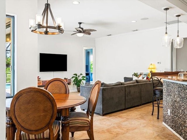 312 148th Ct NE, Bradenton, FL 34212 - dining area with a chandelier, a ceiling fan, ornamental molding, and recessed lighting