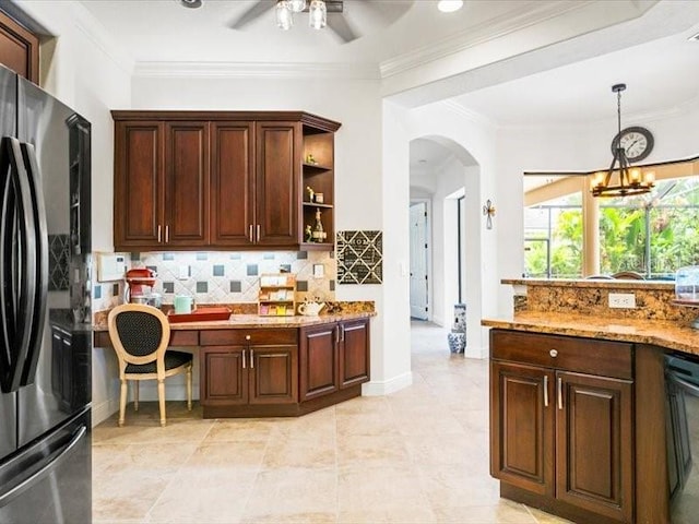 312 148th Ct NE, Bradenton, FL 34212 - kitchen featuring freestanding refrigerator, ceiling fan, arched walkways, open shelves, and a chandelier