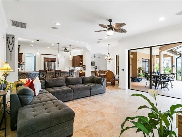 312 148th Ct NE, Bradenton, FL 34212 - living room featuring a chandelier, crown molding, light tile patterned flooring, ceiling fan, and recessed lighting