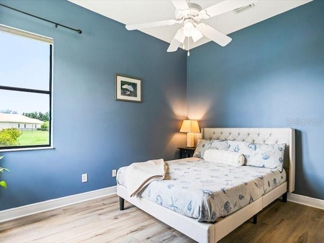 312 148th Ct NE, Bradenton, FL 34212 - bedroom featuring wood finished floors, baseboards, and ceiling fan