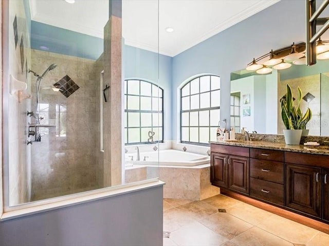 312 148th Ct NE, Bradenton, FL 34212 - bathroom featuring a garden tub, double vanity, a tile shower, crown molding, and tile patterned floors