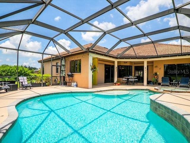 312 148th Ct NE, Bradenton, FL 34212 - view of swimming pool with a patio area, a pool with connected hot tub, and a lanai