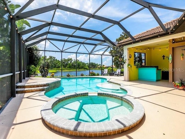 312 148th Ct NE, Bradenton, FL 34212 - view of pool with a patio, a pool with connected hot tub, and a lanai