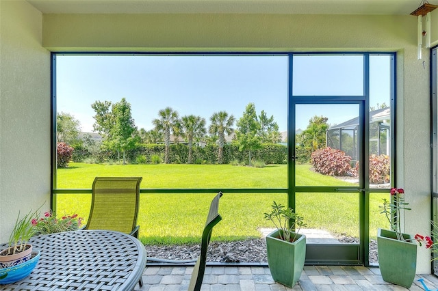 8077 Sandstar Way, Sarasota, FL 34240 - sunroom with plenty of natural light