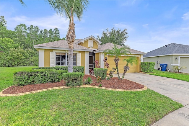 5618 Sheer Bliss Loop, Land O Lakes, FL 34639 - ranch-style home featuring stucco siding, driveway, a front lawn, and a garage