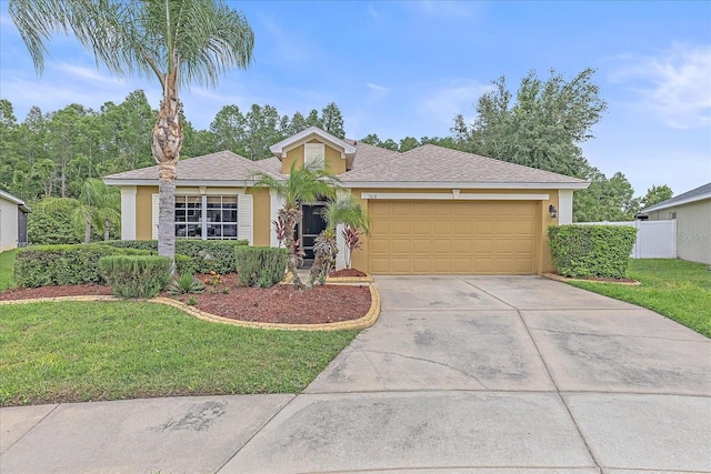 5618 Sheer Bliss Loop, Land O Lakes, FL 34639 - ranch-style house with a garage, stucco siding, and concrete driveway